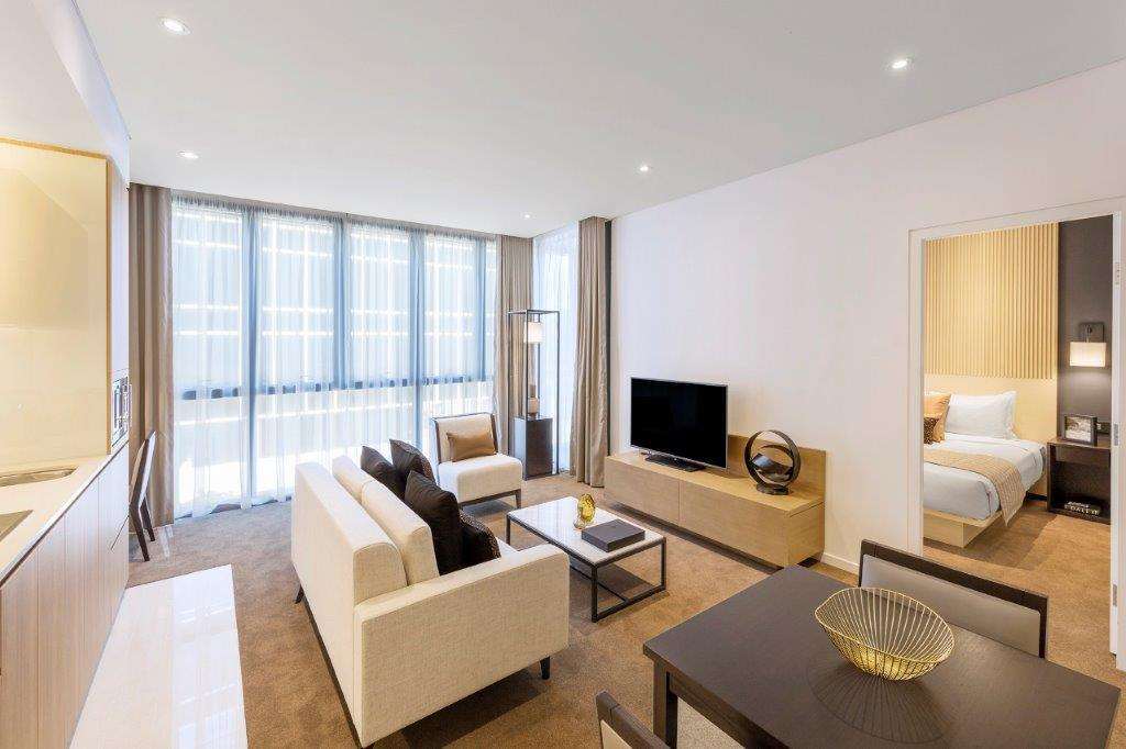 Skye Suites סידני חדר תמונה A living room at the hotel